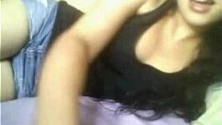 European teen teases with small tits on her live cam - porn video