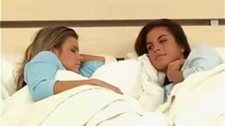 Lesbians play in bed - porn video